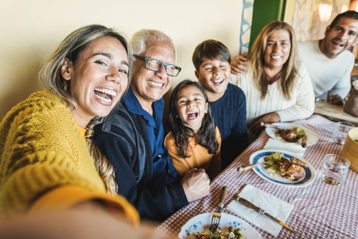 Happy latin family doing selfie while eating toget 2025 10 14 08 41 41 utc